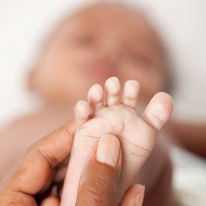image of a baby getting a perinatal massage